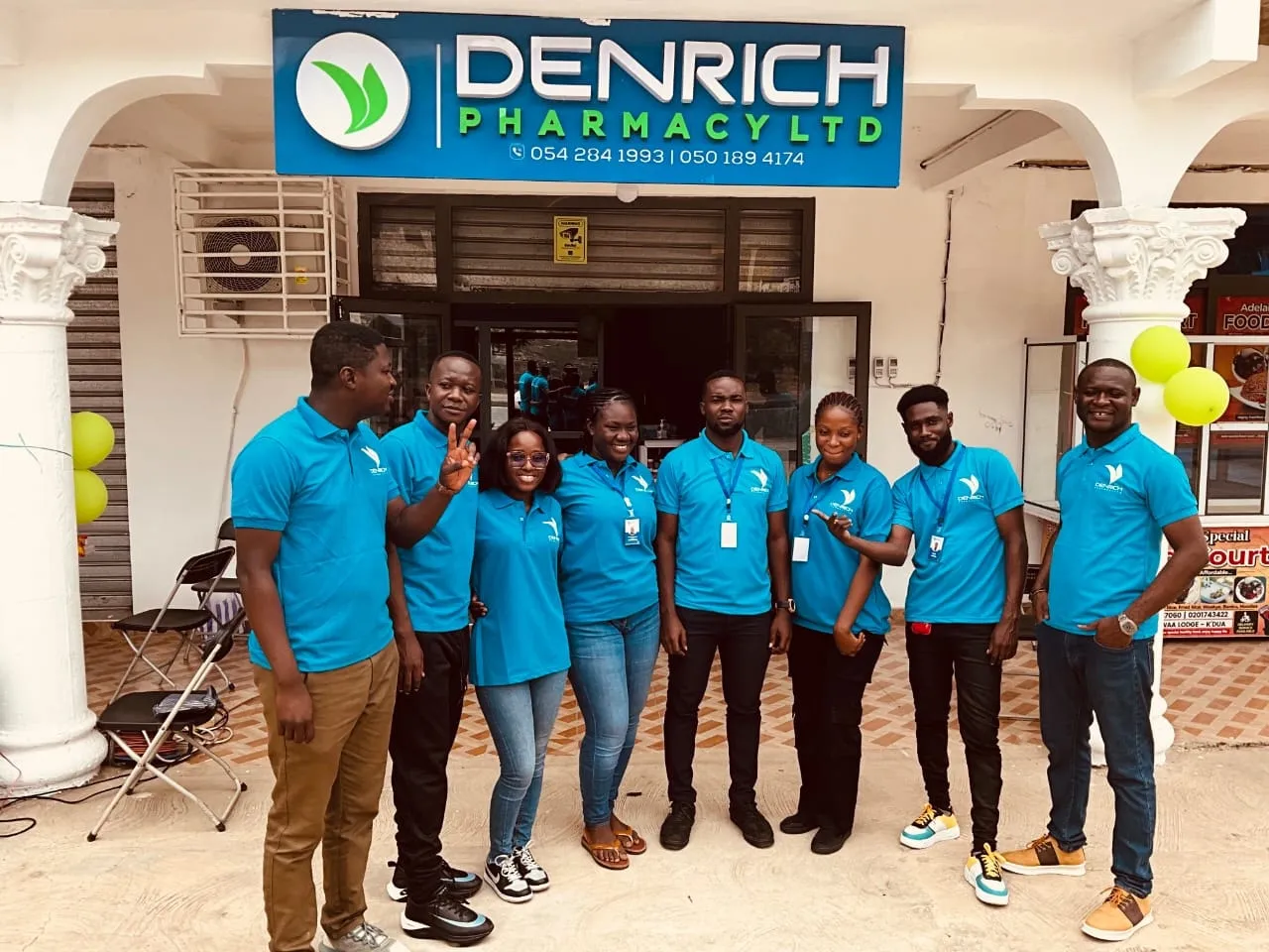 The DenRich Pharmacy team in their blue uniforms outside the pharmacy at Agyeiwaa-Lodge